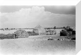 View of round huts with ...