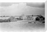 View of round huts with ...