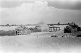 View of round huts with ...