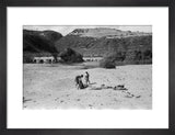 View of three boys resting ...