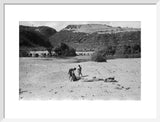 View of three boys resting ...