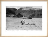 View of three boys resting ...