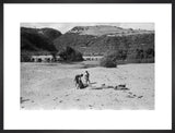 View of three boys resting ...