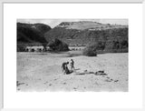 View of three boys resting ...
