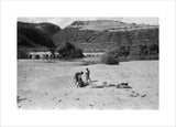 View of three boys resting ...