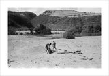 View of three boys resting ...