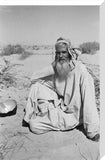 Seated portrait of a tribesman ...