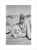 Seated portrait of a tribesman ...