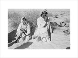 Seated portrait of two tribesmen ...