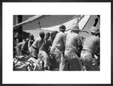 Group portrait of sailors hoisting ...
