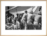 Group portrait of sailors hoisting ...