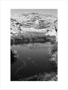 A pool of water in ...