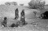 Wilfred Thesiger's party filling water-skins ...