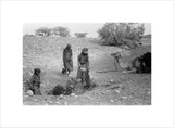 Wilfred Thesiger's party filling water-skins ...