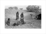 Wilfred Thesiger's party filling water-skins ...