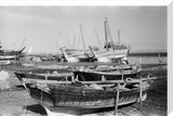 View of dhows (sailboats) beached ...