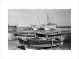 View of dhows (sailboats) beached ...