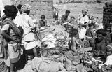 View of vegetable traders at ...