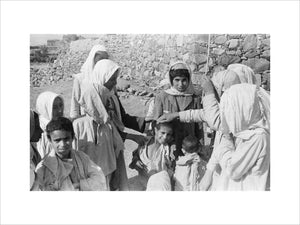 Group portrait of Arab teenaged ...