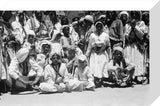 Group portrait of male spectators ...