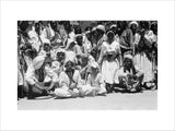 Group portrait of male spectators ...