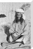 Seated portrait of a tribesman ...