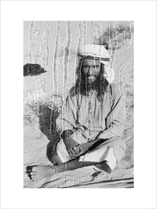 Seated portrait of a tribesman ...