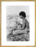 Seated profile portrait of Salim ...