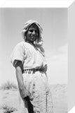 Standing three-quarter length portrait of ...
