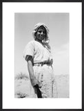 Standing three-quarter length portrait of ...
