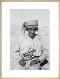 Seated portrait of a tribesman ...