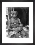 Asante mother with child at naming ceremony